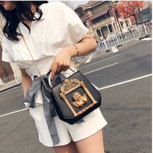 Beautiful gold and black purse